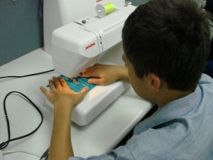 boy-sewing